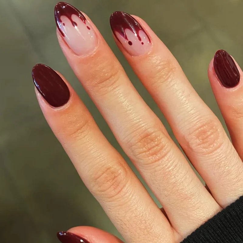 Kunstvolle Nagelverlängerungen mit kreativen Augen-Design Karnz
