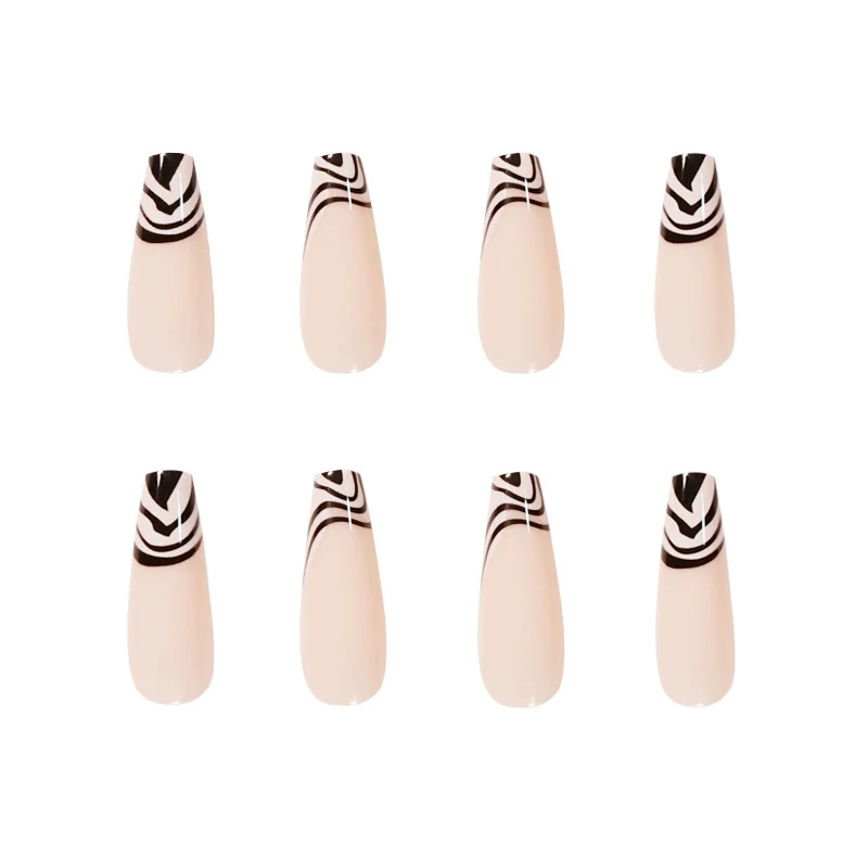 Kunstvolle Nagelverlängerungen mit elegantem Schwarz-Weiß-Muster Karnz