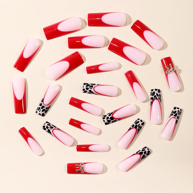 Stylische Acryl-Nagelerweiterungen mit Schleife und Leopardenmuster Karnz