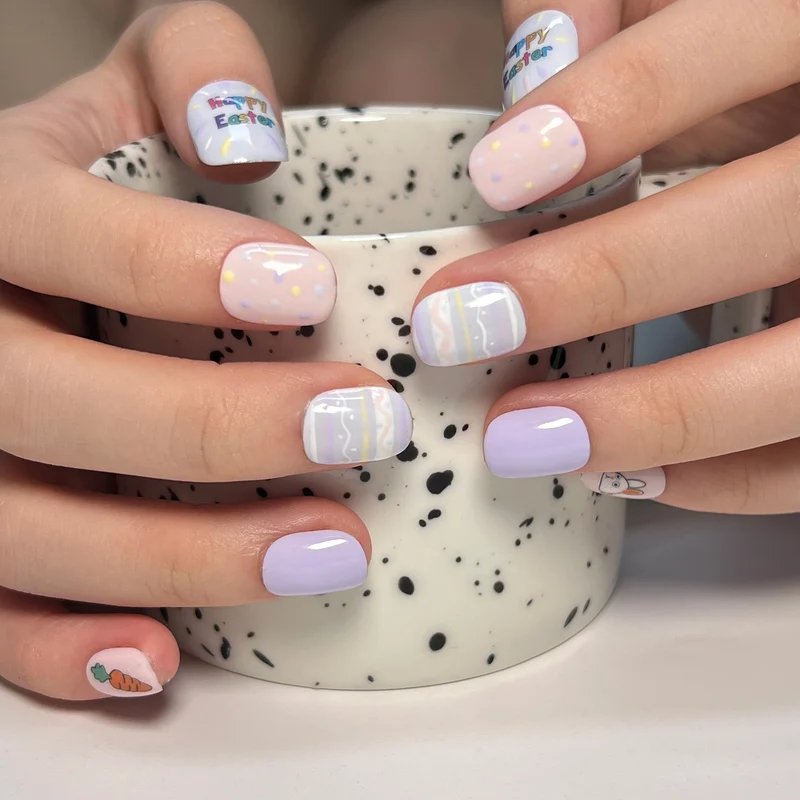 Kunstvolle Nagelkunst mit süßen Tiermotiven und pastellfarbenem Design Karnz