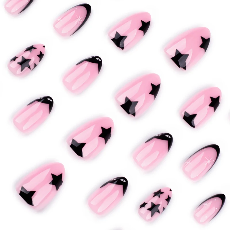 Kunstvolle Nagelkunst mit Sternen- und Schwarzspitzen Design Karnz