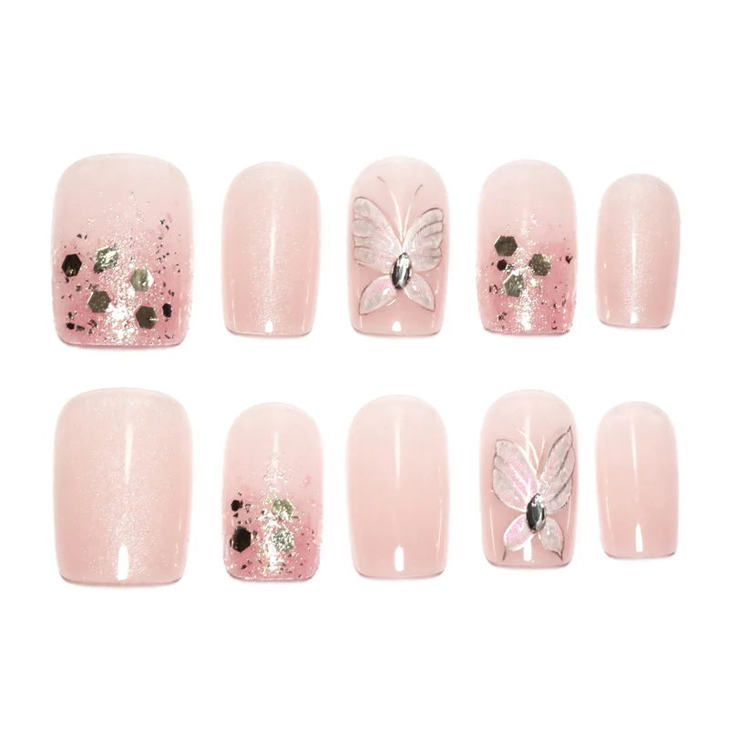 Kunstvolle Nagelkunst mit Schmetterlingsmotiven und Glitzerakzenten Karnz