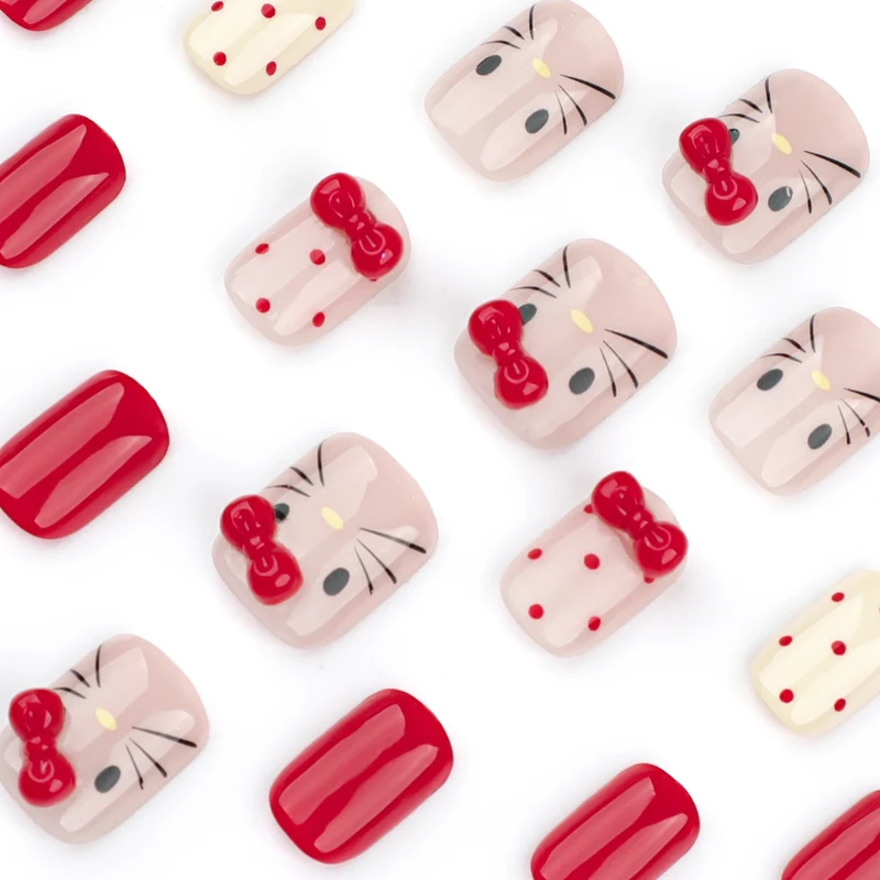 Kunstvolle Nagelkunst mit niedlichen Schleifenmotiven Karnz