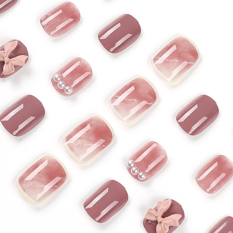 Kunstvolle Nagelkunst mit luxuriösen 3D-Schleifen und eleganten Akzenten Karnz