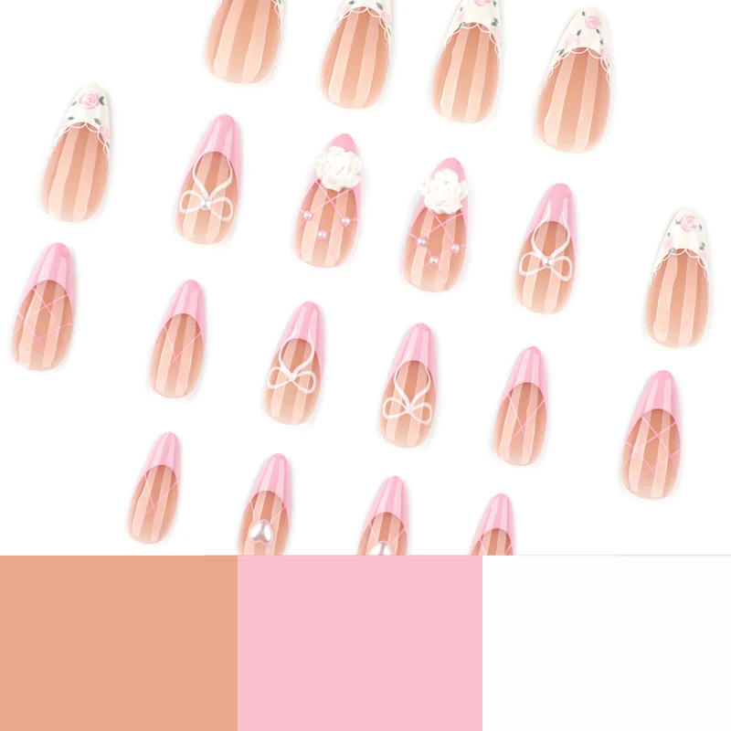 Kunstvolle Nagelkunst mit floralen Details und Schleifenverzierungen Karnz