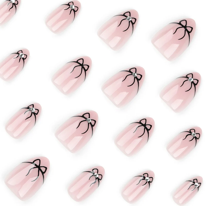 Kunstvolle Nagelkunst mit eleganten Schleifenmotiven Karnz