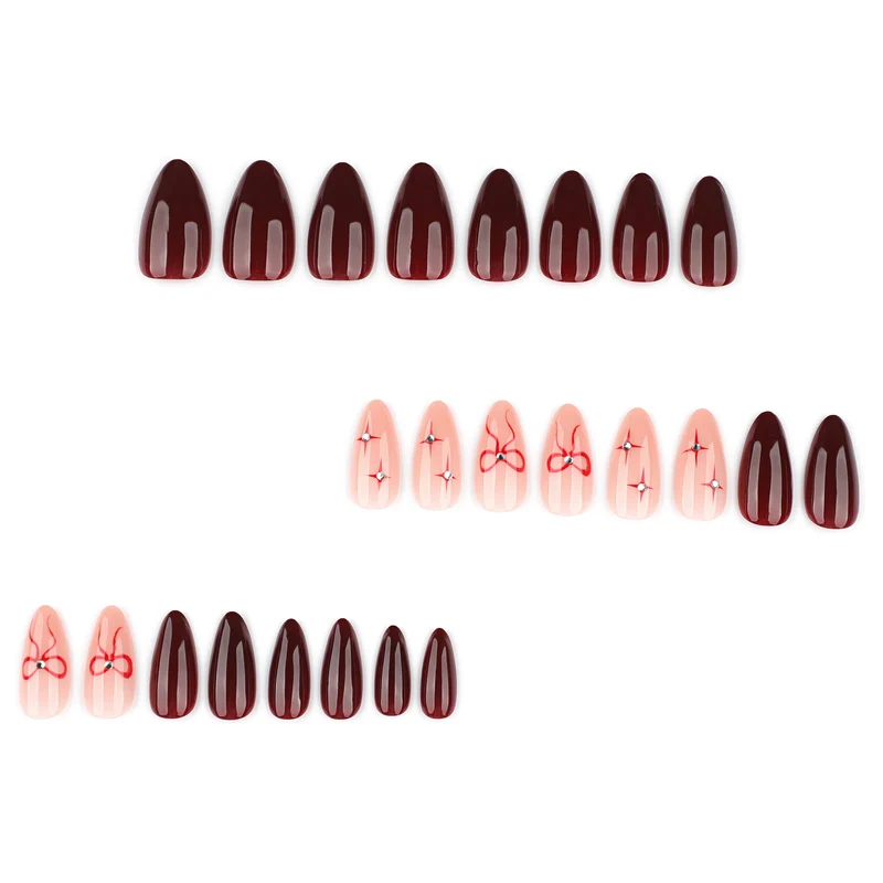 Kunstvolle Nagelkunst mit eleganten Schleifen und Strassverzierungen Karnz