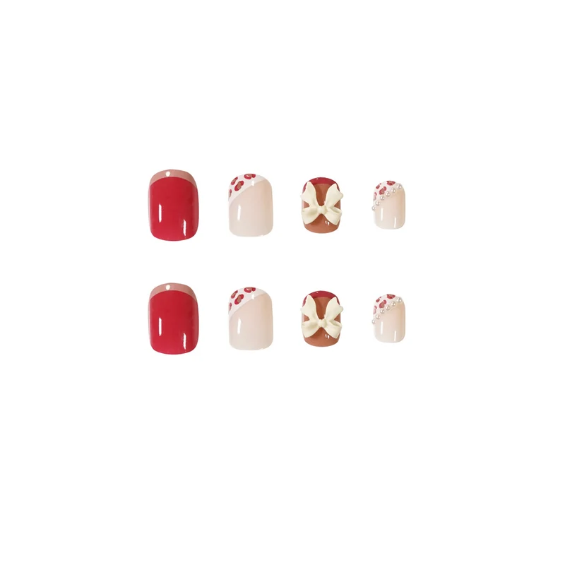 Kunstvolle Nagelkunst mit elegantem Schleifen-Design Karnz
