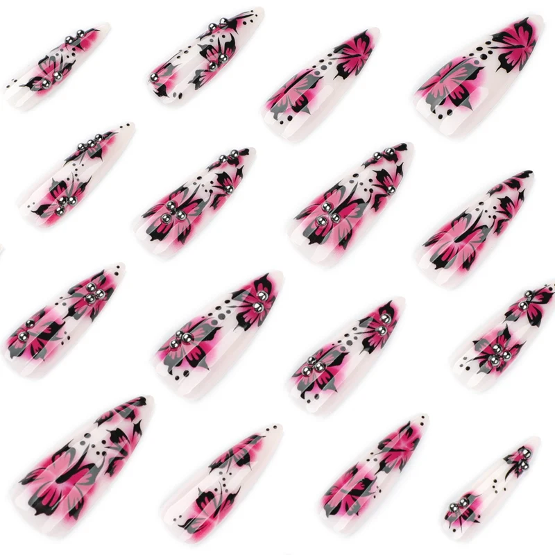 Kunstvolle Nagelkunst mit Blumen-Design und Strass-Akzenten Karnz