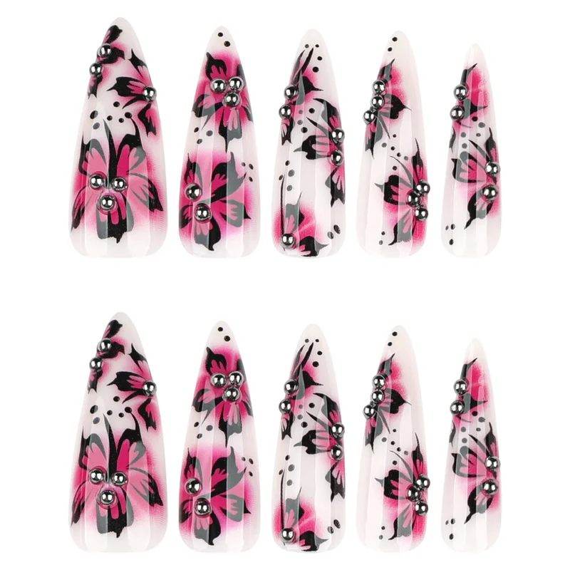Kunstvolle Nagelkunst mit Blumen-Design und Strass-Akzenten Karnz