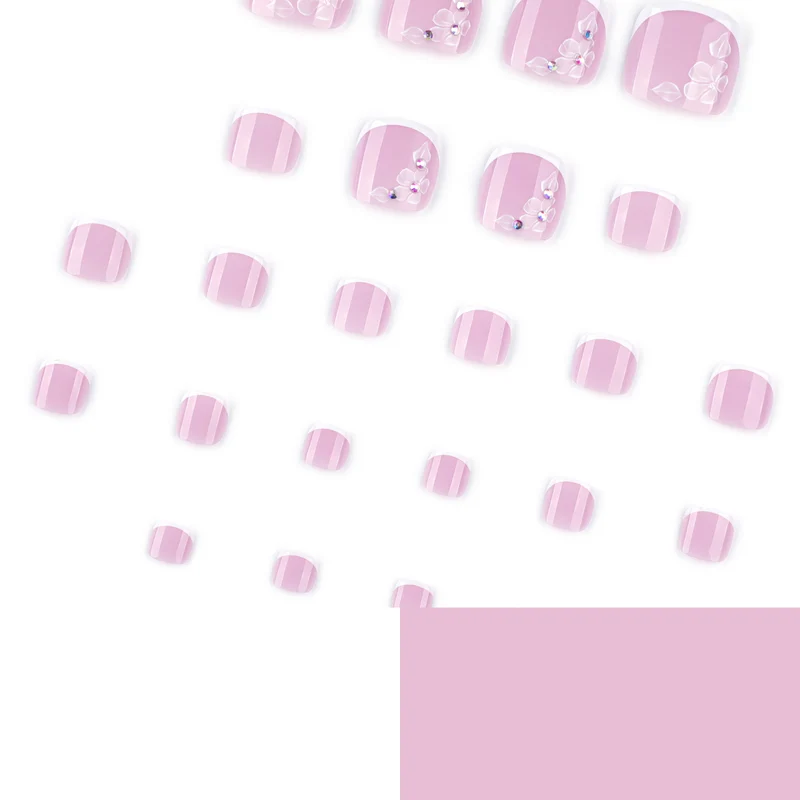 Kunstvolle Fußnagelgestaltung mit filigranen Blüten und Glitzerbesatz Karnz