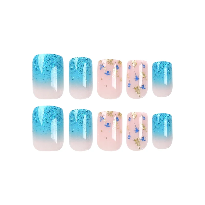 Kunstvolle Acryl-Nägel mit floralem Design und Glitzer Effekten Karnz