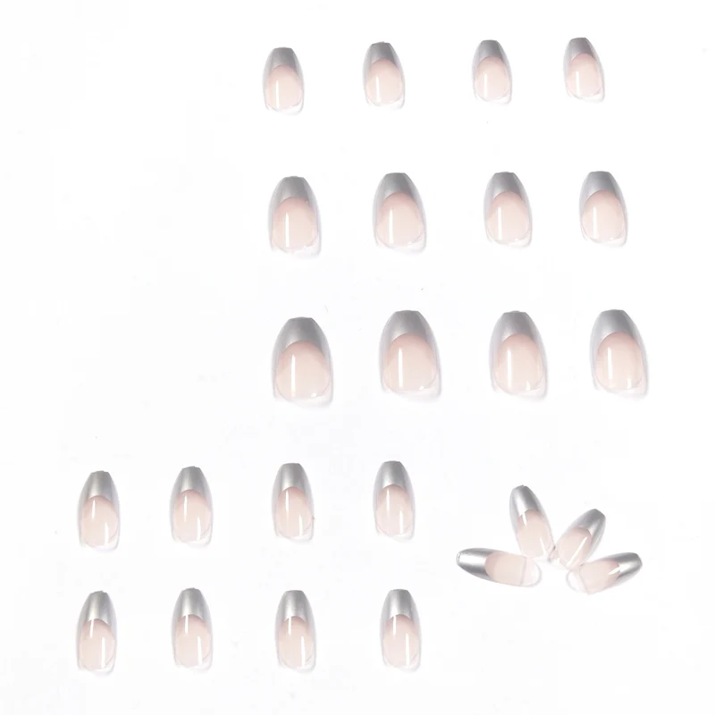 Künstliche Stiletto-Nägel mit Glitzerakzenten und elegantem French-Tip Karnz