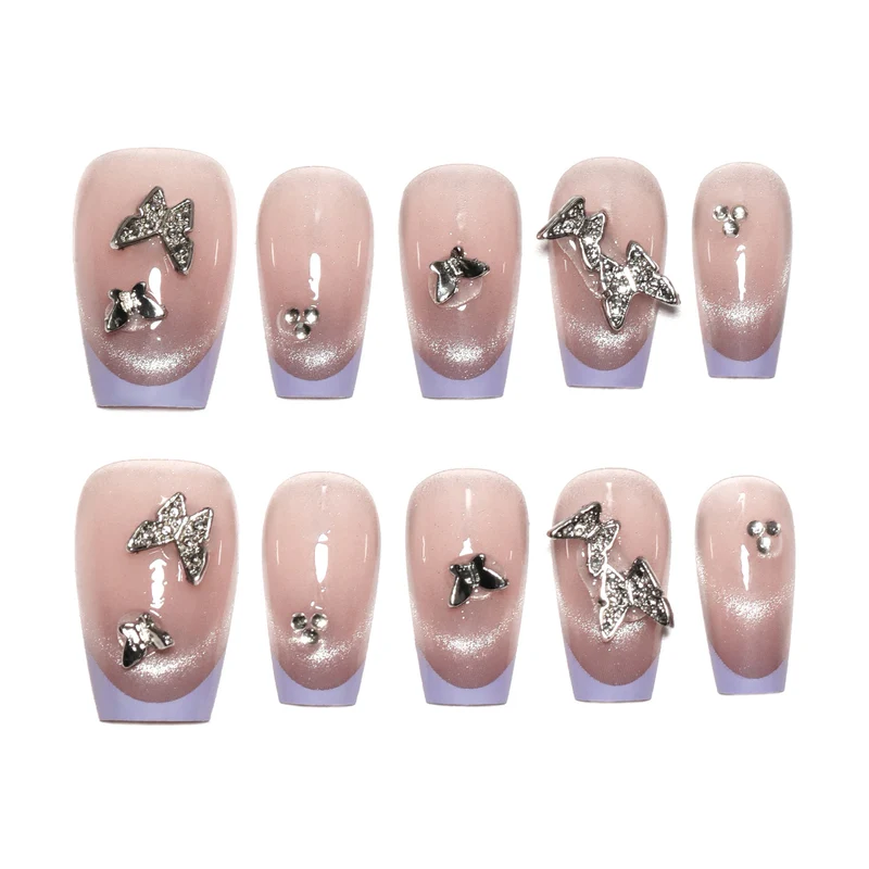 Künstliche Nagelverlängerungen mit Glitzerdesign und edlen Akzenten Karnz