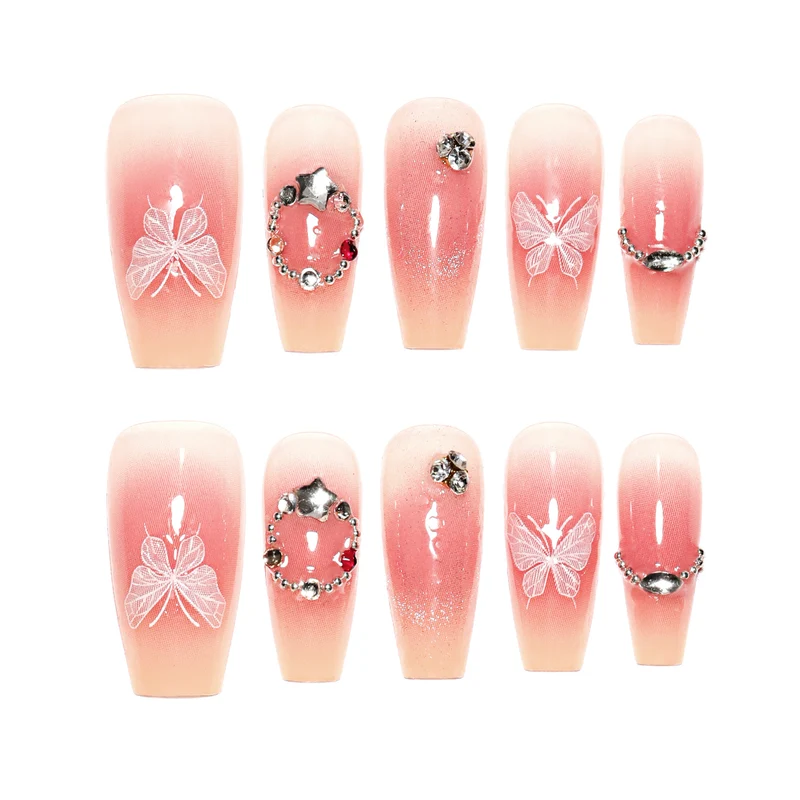 Künstliche Nagelverlängerungen mit floralem Design und funkelnden Akzenten Karnz