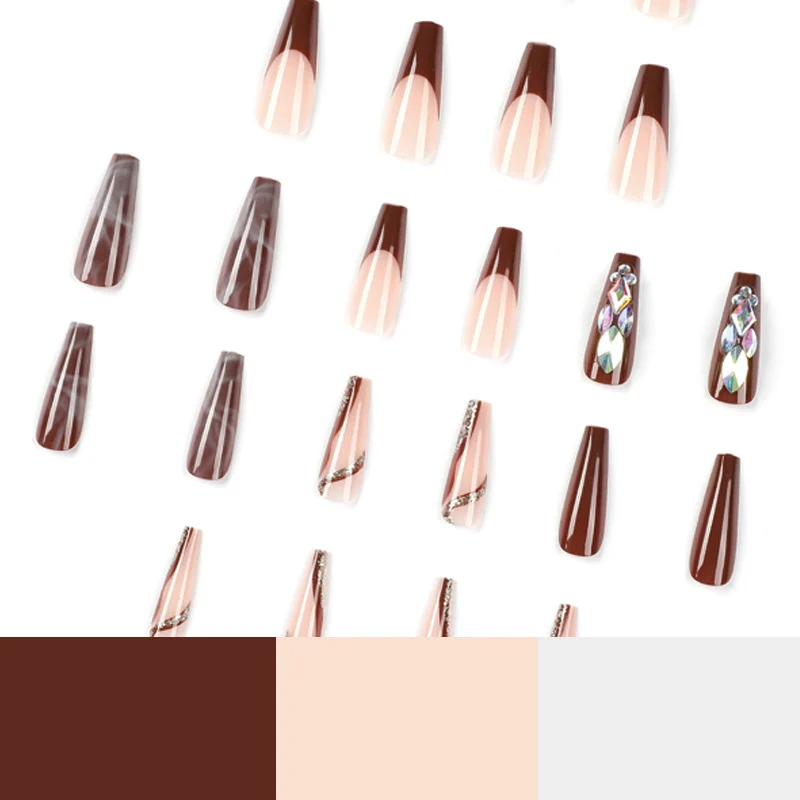 Künstliche Nagelverlängerungen mit eleganten Edelsteinverzierungen Karnz