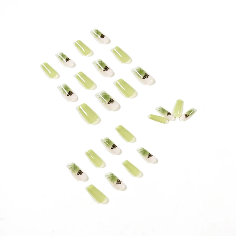 Künstliche Nagelverlängerungen mit elegantem Schmetterlingsdesign Karnz