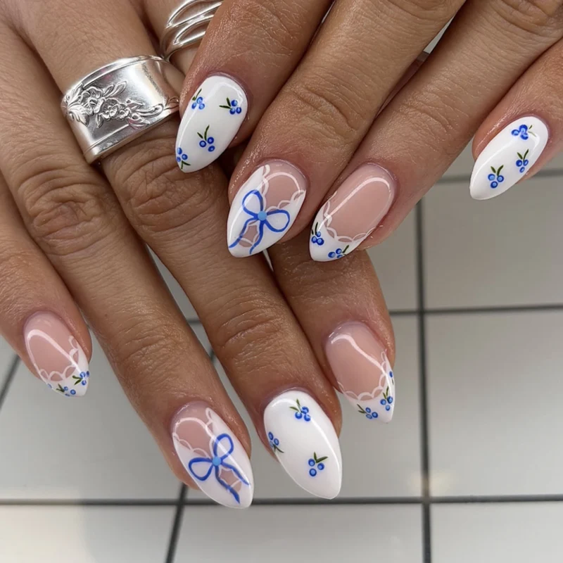 Künstliche Nagelkunst mit verspielten Punkten und Schleifen Karnz