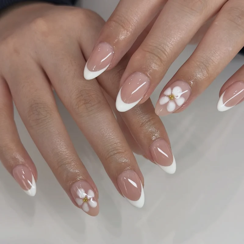 Künstliche Nagelkunst mit verspielten Punkten und Schleifen Karnz