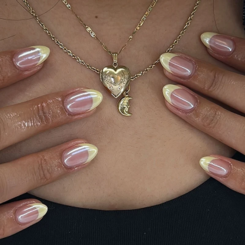 Künstliche Nagelkunst mit verspielten Punkten und Schleifen Karnz