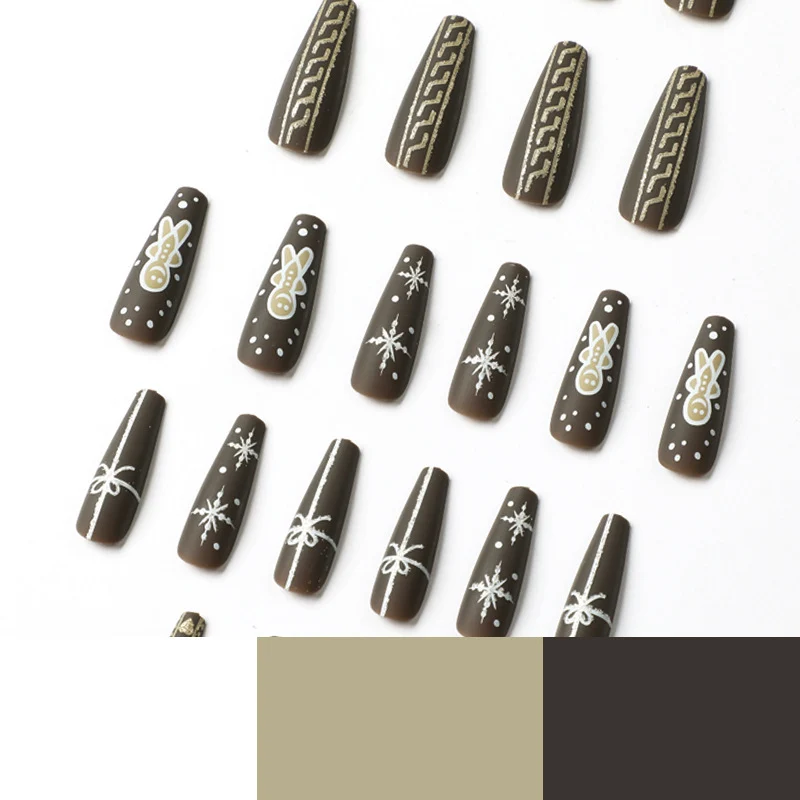 Künstliche Nagelkunst mit festlichem Lebkuchen-Design Karnz