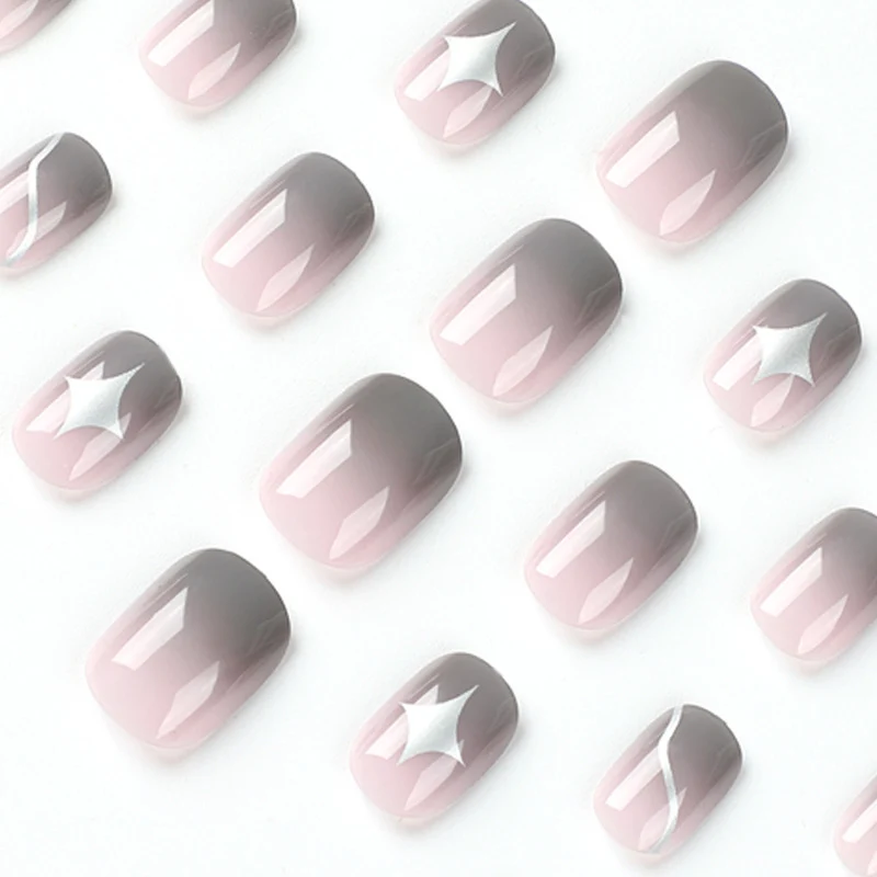 Künstliche Nagelkunst mit elegantem Ombre-Design und reizvollen Akzenten Karnz