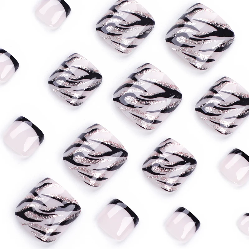 Künstliche Fußnagelkunst im eleganten Schwarz-Weiß-Design Karnz