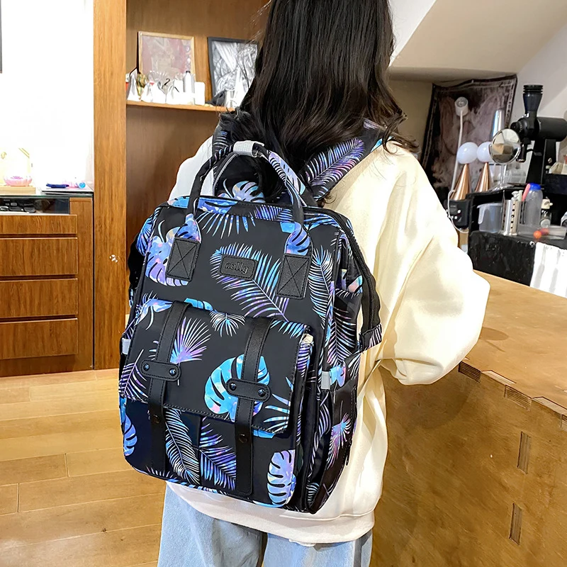 Vielseitiger charakterbezogener Baby-Pflege-Rucksack Karnz