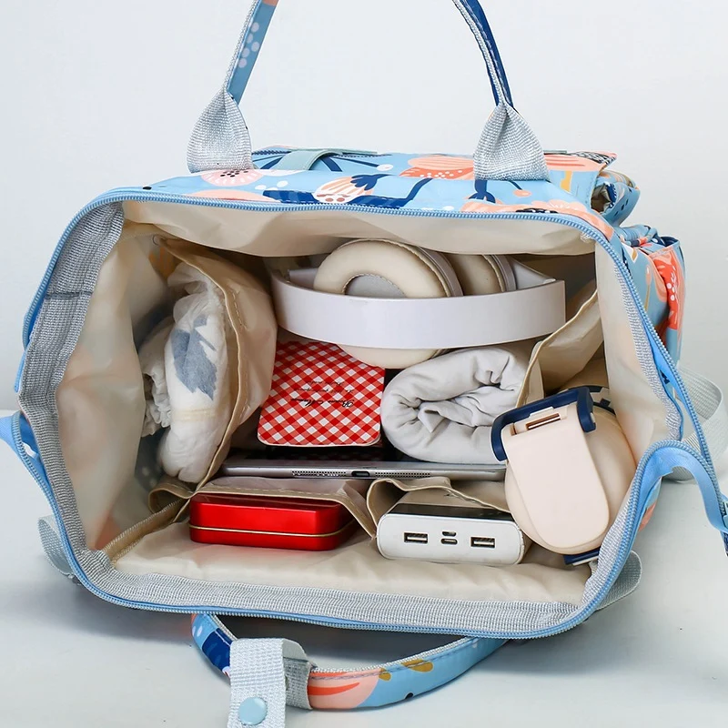 Vielseitiger charakterbezogener Baby-Pflege-Rucksack Karnz