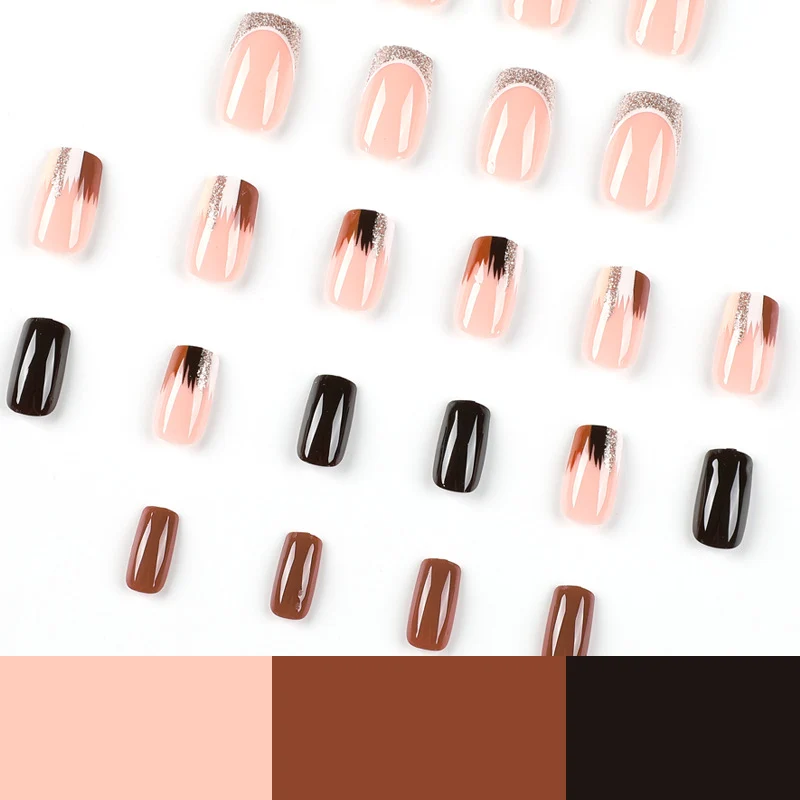 Elegante Künstliche Nagelverlängerungen mit Farbverlauf und Glitzerdetails Karnz