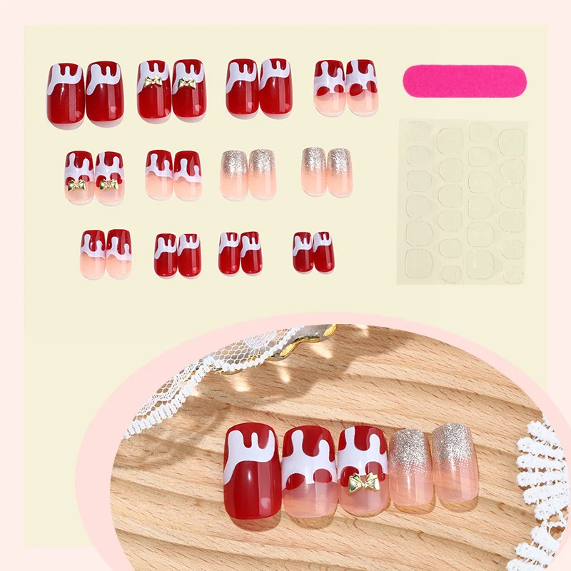 Kreatives Kunstnagelset mit verspieltem Zuckerguss-Design Karnz