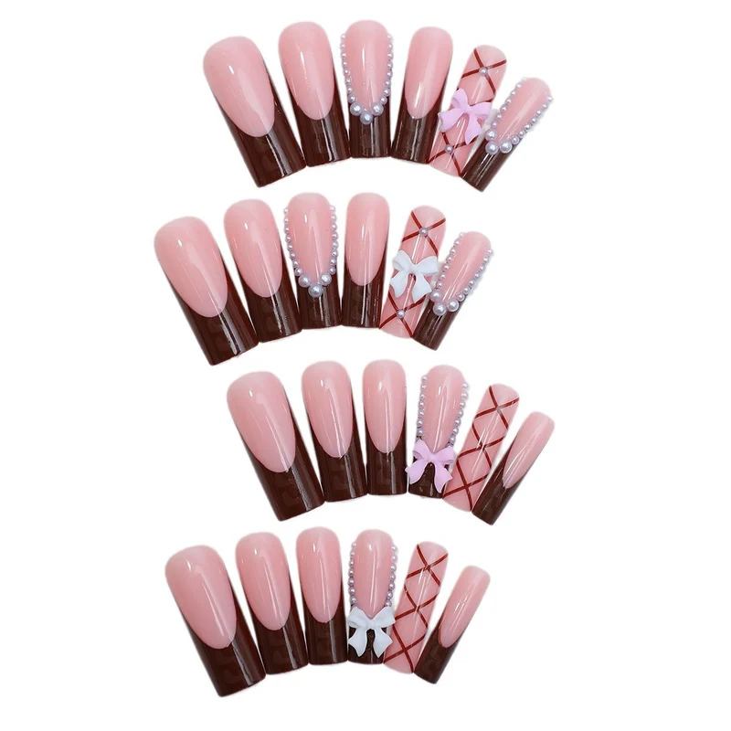 Kreatives Kunstnagelset mit stilvollen Schleifen- und Glitzerakzenten Karnz