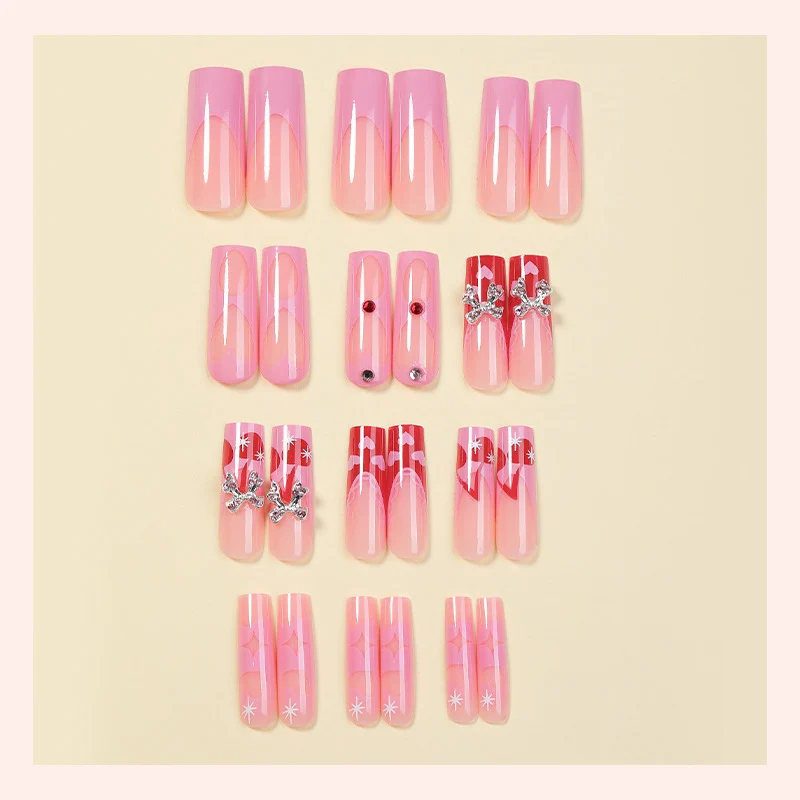 Kreatives Kunstnagelset mit Glitzer- und Herzmotiven Karnz
