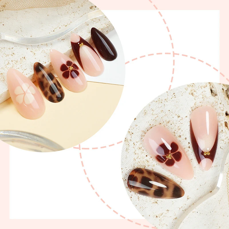 Kreatives Kunstnagelset mit floralem und Leoparden-Muster Karnz