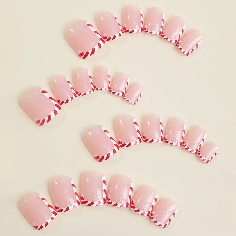 Kreatives Kunstnagelset mit festlichem Zuckerstangen-Design Karnz