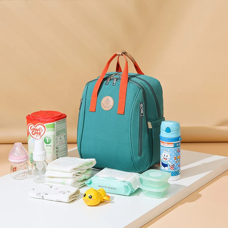 Vielseitiger Mehrfachfach Baby-Pflege-Rucksack Karnz