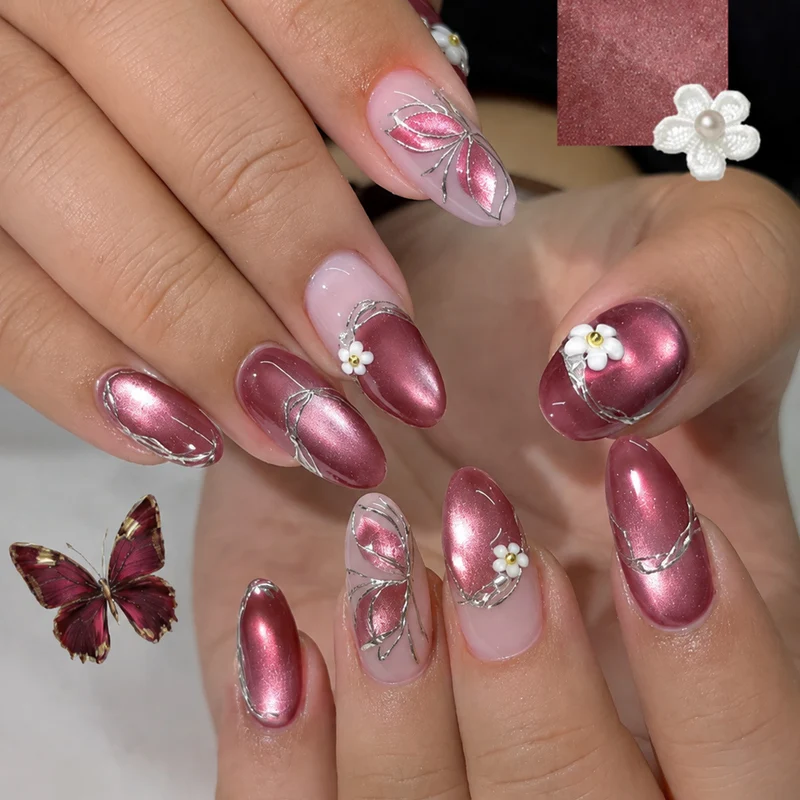 Elegantes Kunstnagelset mit Glitzer- und Blütenverzierungen Karnz