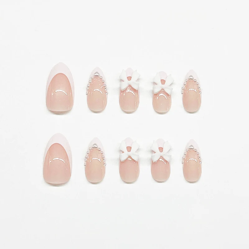 Elegante mit Schleifen verzierten Acryl-Nagelerweiterungen Karnz