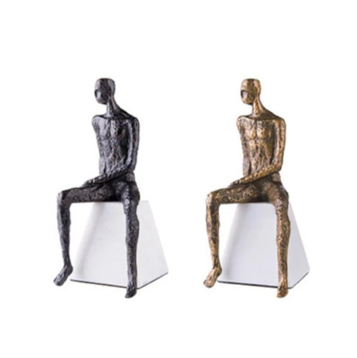 Künstlerische Sitzfigur Skulptur