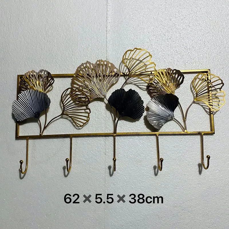 Dekorativer Metall Wandhakenregal mit Ginkgo-Blatt-Design Karnz