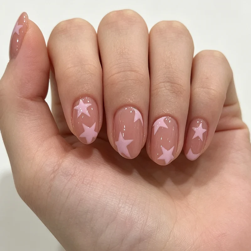 Künstlerisches Sternmuster Nagelkunst Karnz