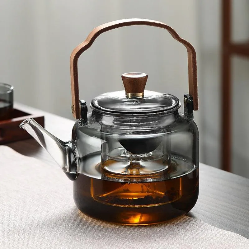 Eleganter Glas- und Holz-Teekessel für die perfekte Zubereitung von losen Teeblättern