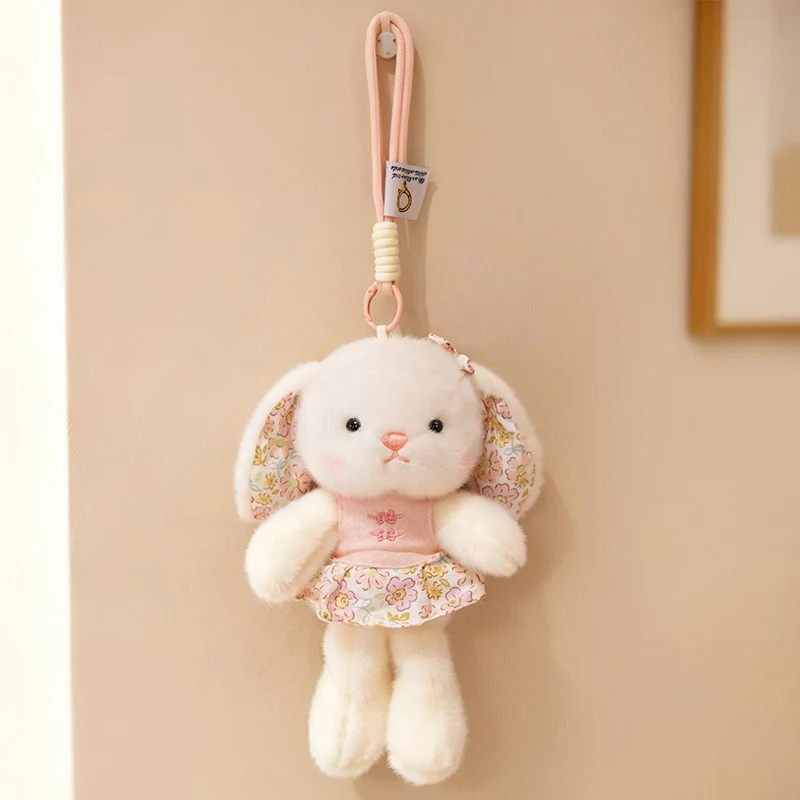 Plüsch Hase Taschenanhänger Schlüsselanhänger mit dekorativem Bogen und floralem Kleid Karnz